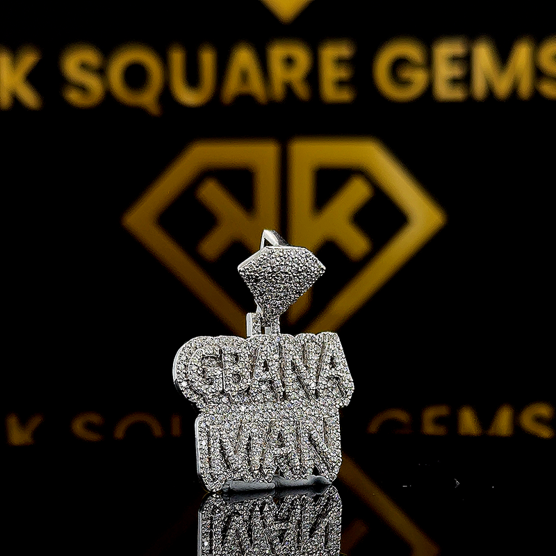 The GemKing Round Moissanite Hip Hop Pendant features a 1.65 Ct VVS1 Moissanite diamond in 925 sterling silver