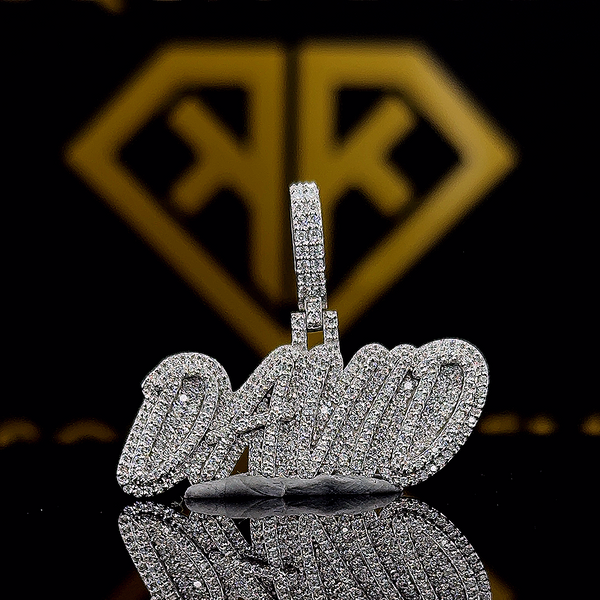 The SparkLit Round Moissanite Hip Hop Pendant features a 1.18 Ct VVS1 Moissanite diamond in 925 sterling silver