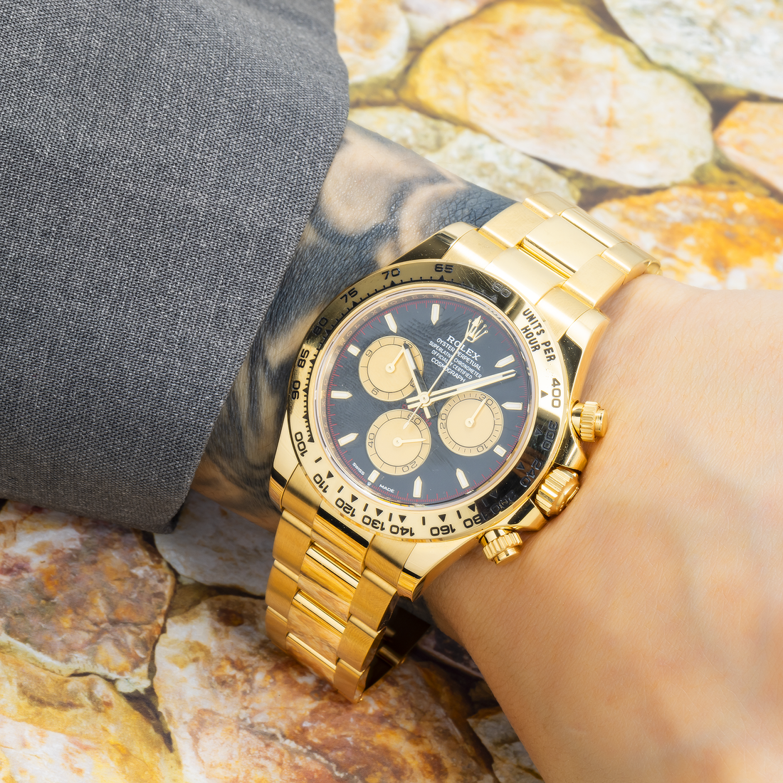 Rolex Daytona Black Dial With Yellow Metal Oyster Bracelet Watch Front View