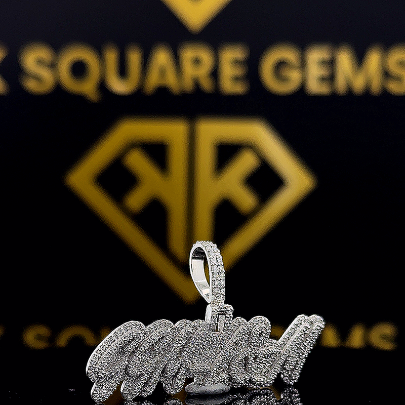 The GlowRush Round Moissanite Hip Hop Pendant features a 1.32 Ct VVS1 Moissanite diamond in 925 sterling silver