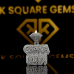 The GemKing Round Moissanite Hip Hop Pendant features a 1.65 Ct VVS1 Moissanite diamond in 925 sterling silver