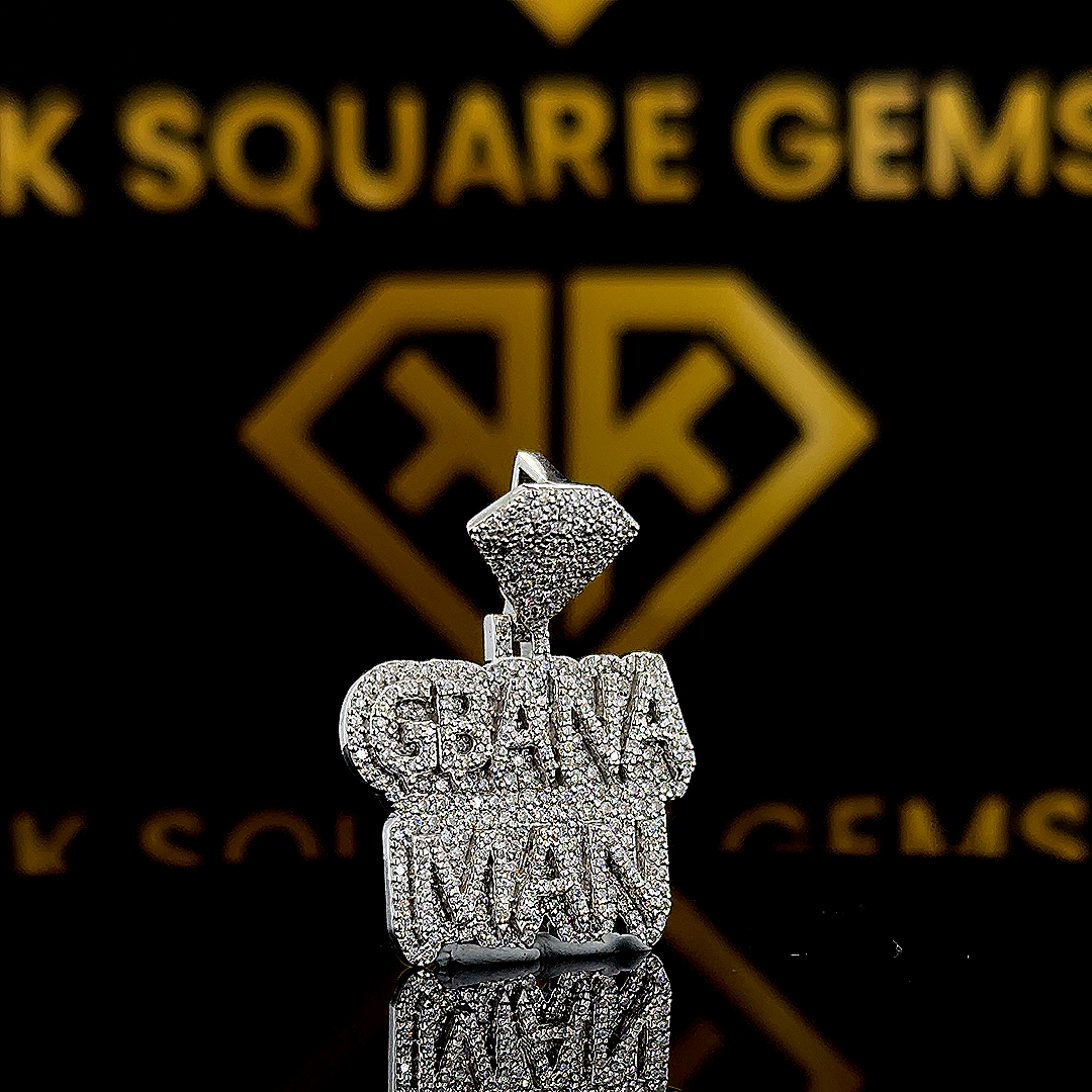 The GemKing Round Moissanite Hip Hop Pendant features a 1.65 Ct VVS1 Moissanite diamond in 925 sterling silver