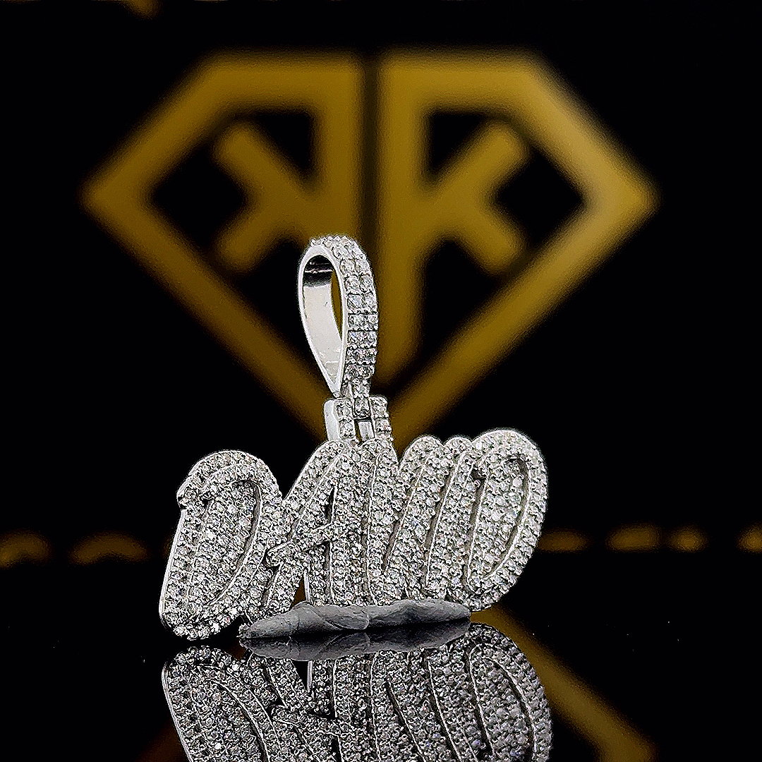 The SparkLit Round Moissanite Hip Hop Pendant features a 1.18 Ct VVS1 Moissanite diamond in 925 sterling silver