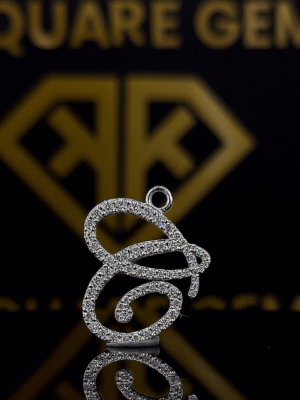 The Gliss Round Moissanite Hip Hop Pendant showcases a 1.10 Ct VVS1 moissanite diamond in 925 sterling silver