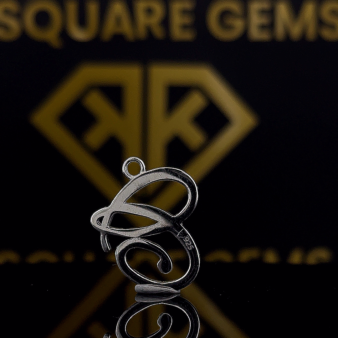 The Gliss Round Moissanite Hip Hop Pendant showcases a 1.10 Ct VVS1 moissanite diamond in 925 sterling silver