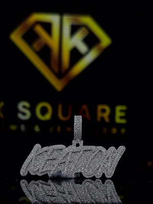 The VibeFlow Round Moissanite Hip Hop Pendant features a 1.89 Ct VVS1 Moissanite diamond in 925 sterling silver