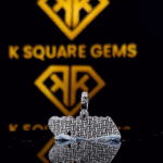 The CharmX Round Moissanite Hip Hop Pendant features a 1.05 Ct VVS1 Moissanite diamond in 925 sterling silver
