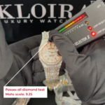 Two Tone AP Moissanite Diamond Watch being tested for durability with diamond tester.