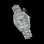 Blue Roman Numerals Dial Baguette Strap Iced Out Moissanite Watch Close Up Front View