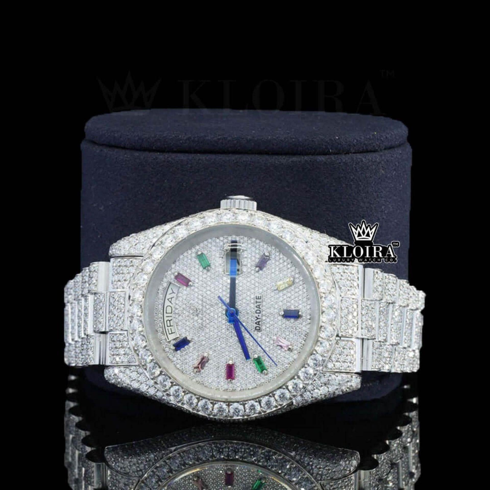 Day Date Display Rainbow Stick Markers Dial Full Iced Out Moissanite Watch Close Up Front View