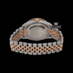 Dual Tone Rose Gold Dial Red Arabic Numerals Iced Out Moissanite Watch Caseback View