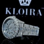 Fully Iced Out White Dial Black Stick Markers Baguette Moissanite Watch Left Strap View