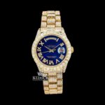 Gold Tone Blue Roman Dial Day Date Display Iced Out Moissanite Watch
