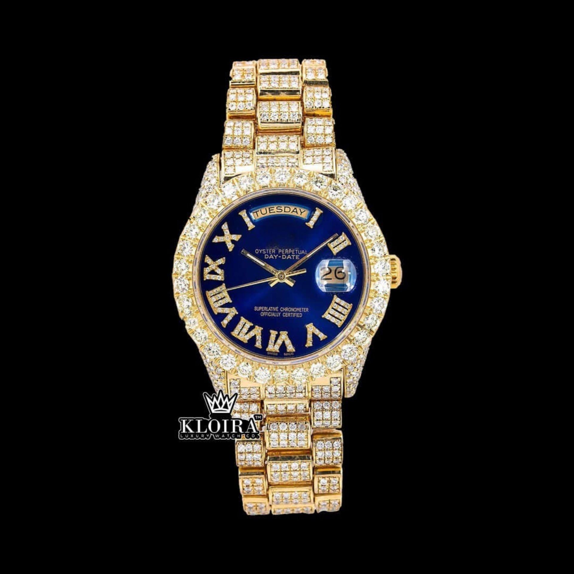 Gold Tone Blue Roman Dial Day Date Display Iced Out Moissanite Watch Front View